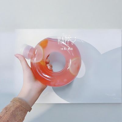 Custom Shape Plastic Juice Bottle 550ml PP Donut Shaped Juice PETG Milk Tea Plastic Bottle with Pull Ring Lid